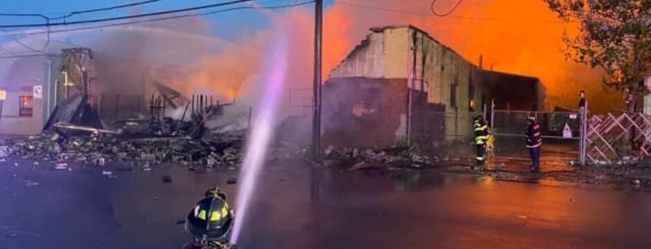 Raging Fire Consumes Paterson Warehouse, Threatens Neighboring Buildings