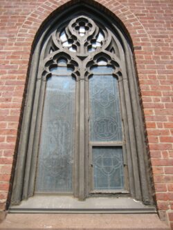 View of church window, restored wood frame