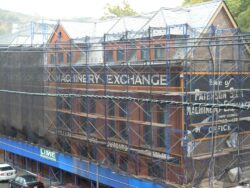 frame scaffolding sidewalk bridge with mesh containment in Paterson, NJ