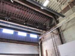 Interior view of Five Boroughs Brewing Co. Brewery before Interior Painting.